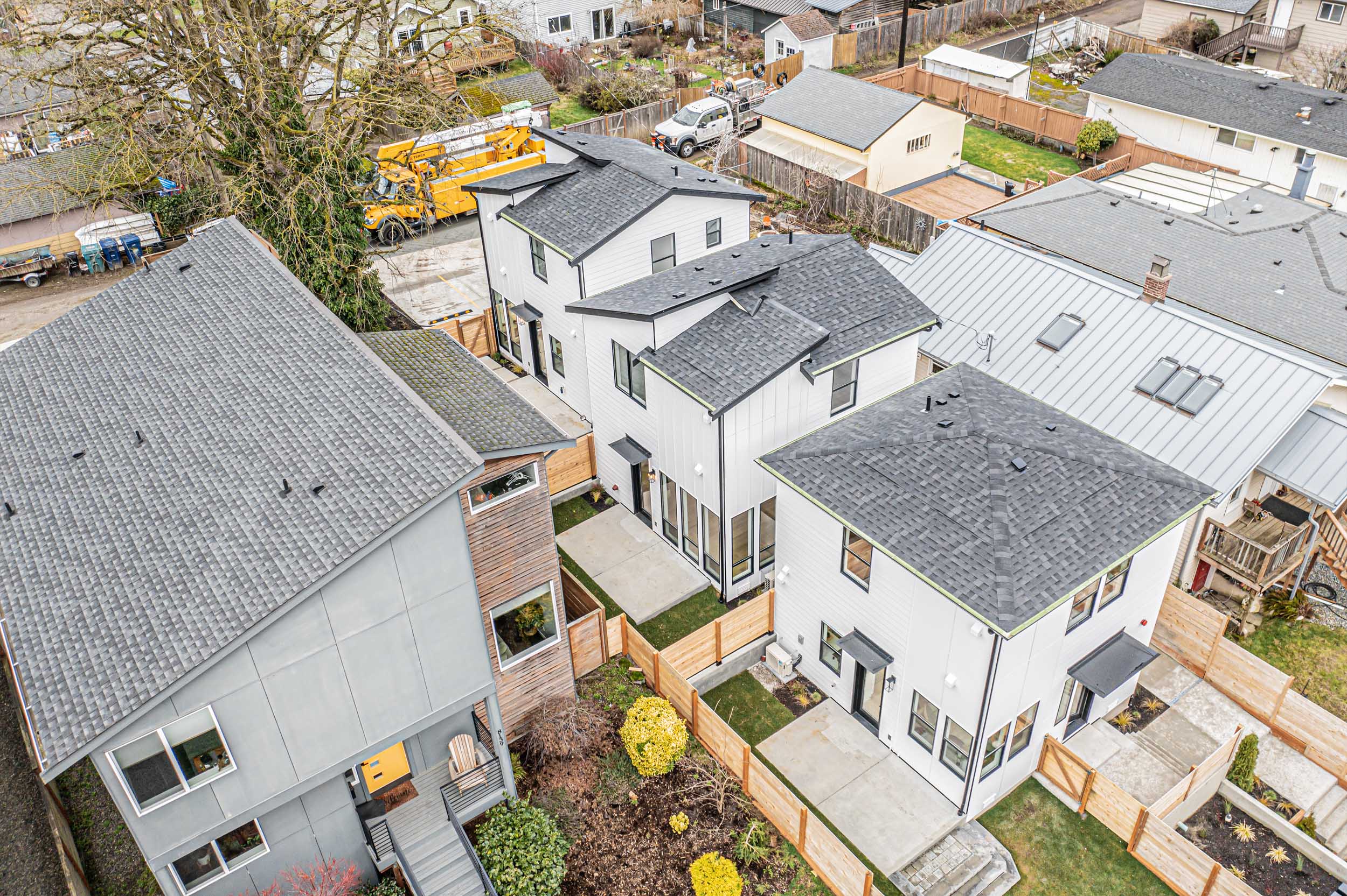 Aerial photos of a brand new SFR & ADU construction located at 8133 18th Ave SW Seattle, WA 98106